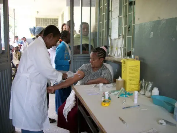Nurse applying vaccine