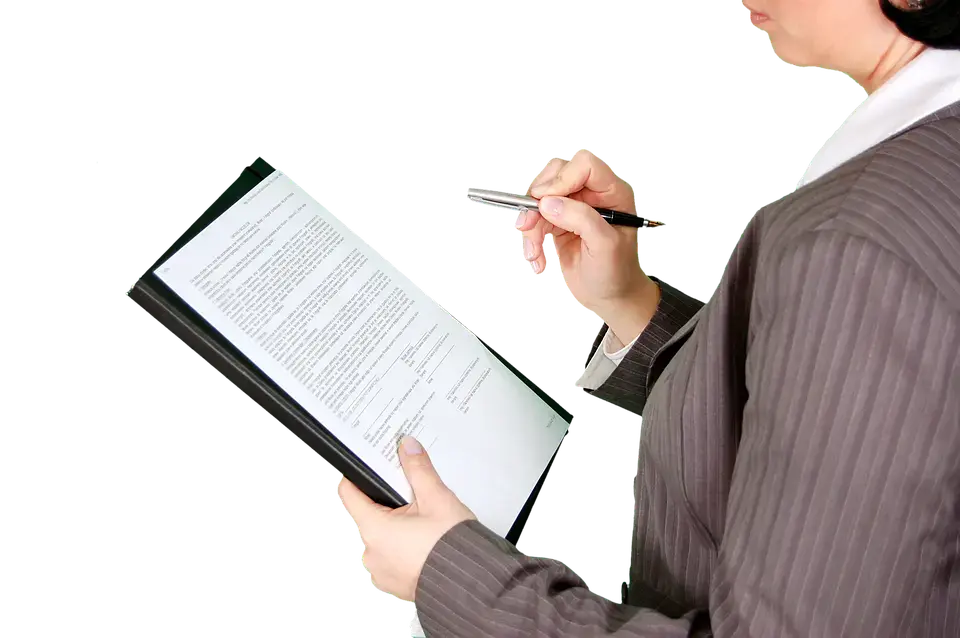 Person holding a document