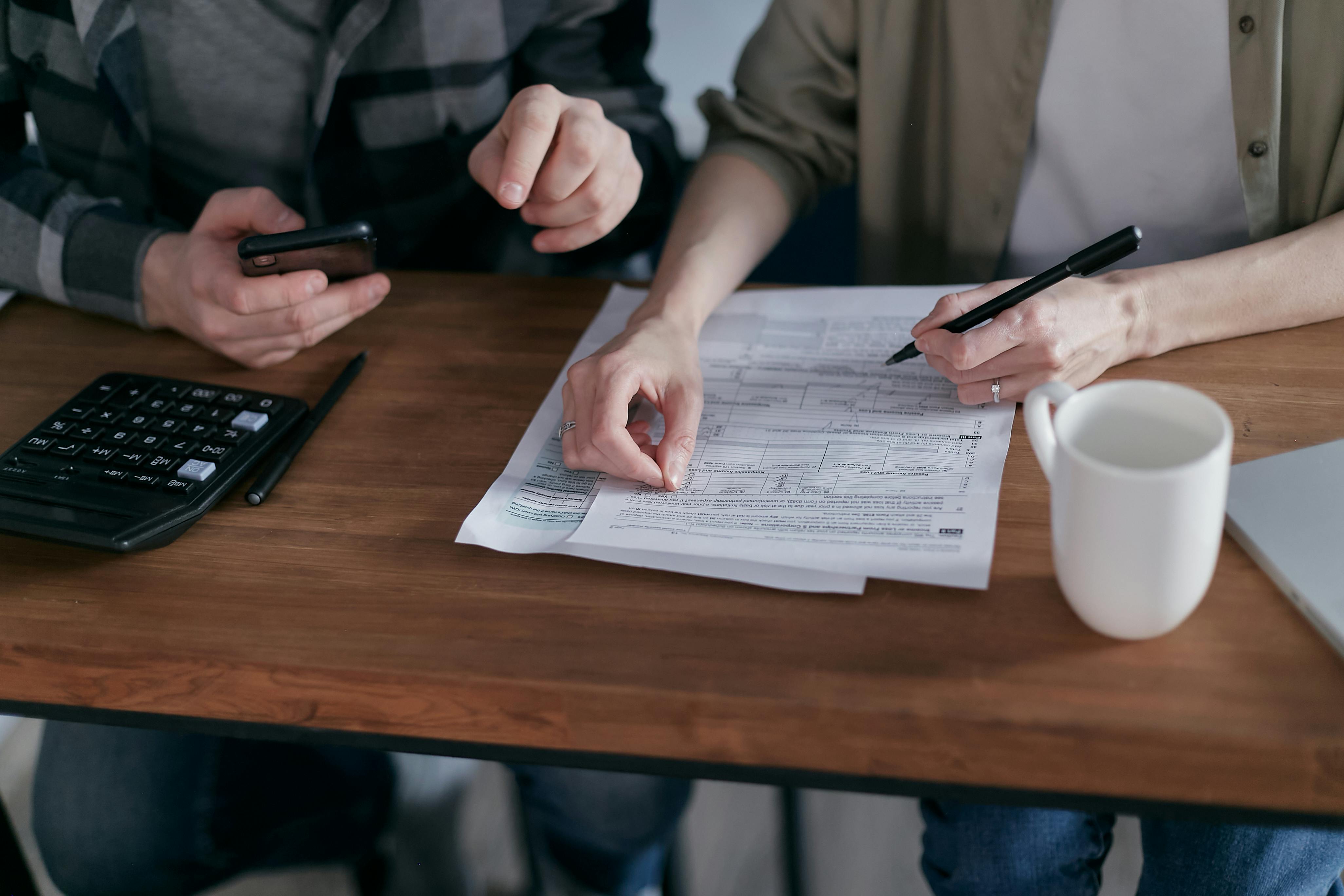 Tax form next to calculator